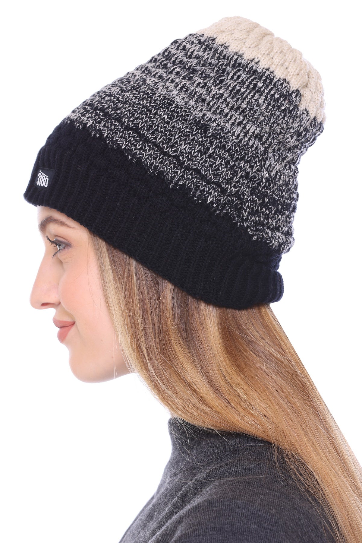 Chic Noir Elegance: Black and Beige Blend Ladies Winter Cap for a Stylish Winter Statement